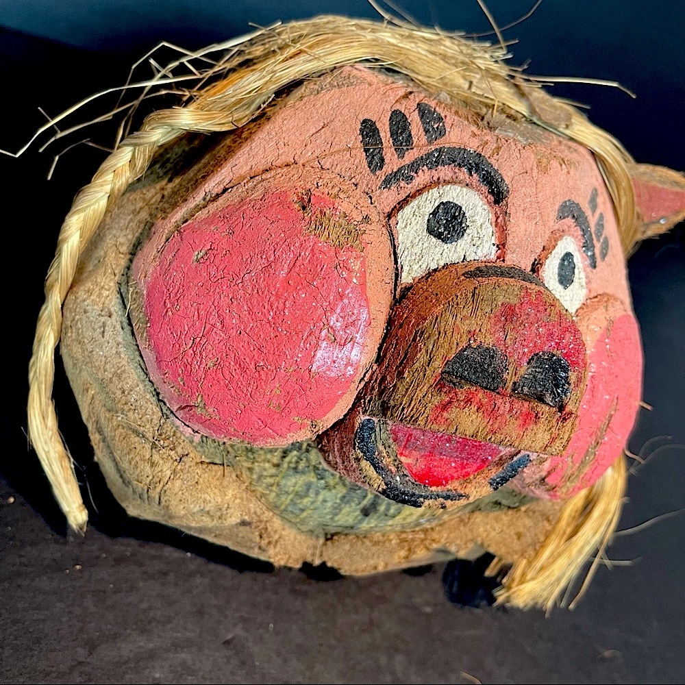 vintage coconut pig sculpture